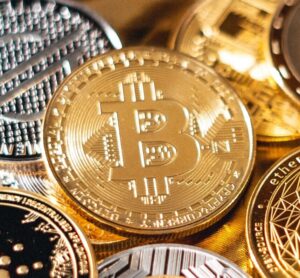 silver and gold round crypto coins